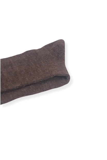 half british everyday alpaca sock in brown, folded neatly on a white background to highlight the natural alpaca wool texture and rich brown tone