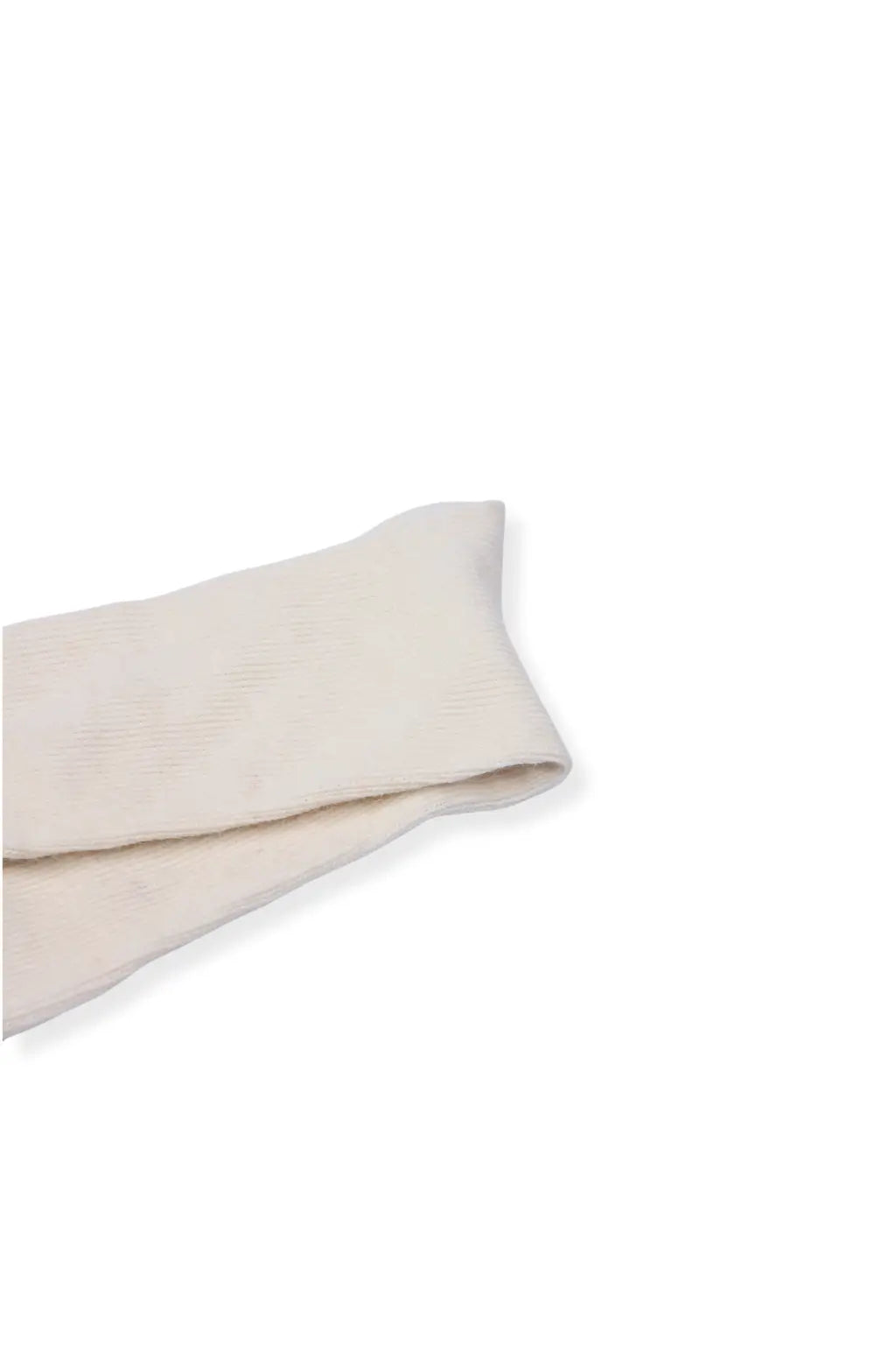 half british everyday alpaca sock in cream, folded on a white background to highlight its natural alpaca wool texture and warm beige tone