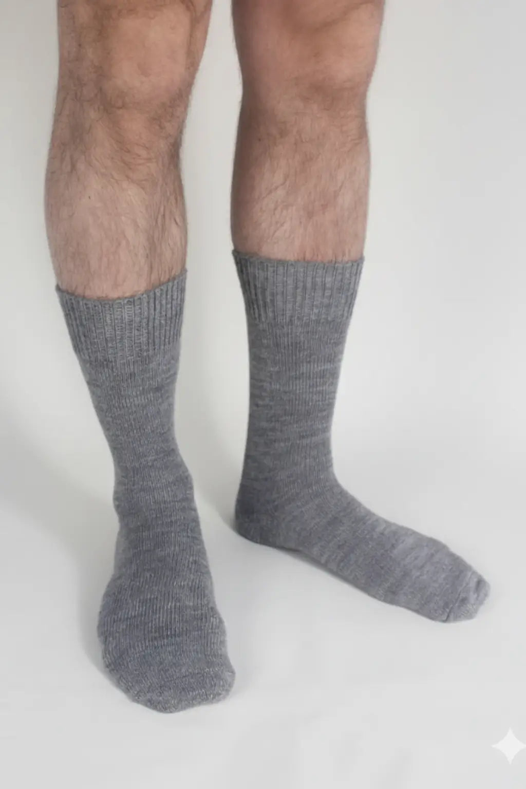 half british everyday alpaca socks in light , worn to highlight the fine ribbed knit and soft alpaca wool texture against a clean white backgroundrey