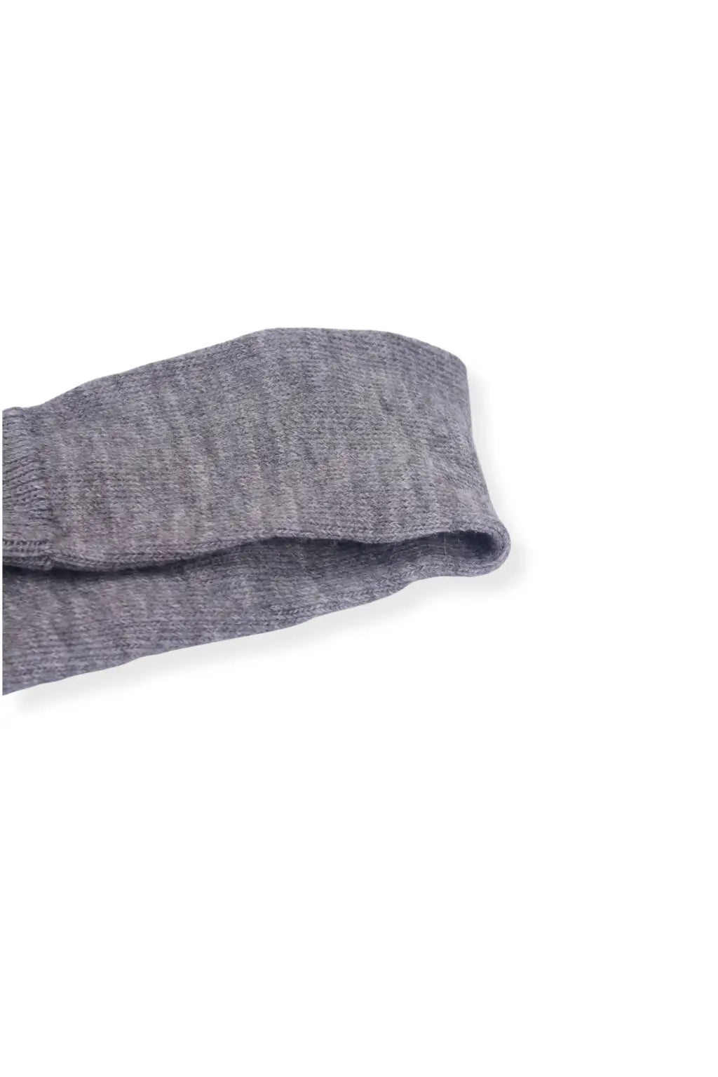 half british everyday alpaca sock in light grey, folded neatly on a white background to highlight the soft alpaca wool texture and subtle ribbed knit